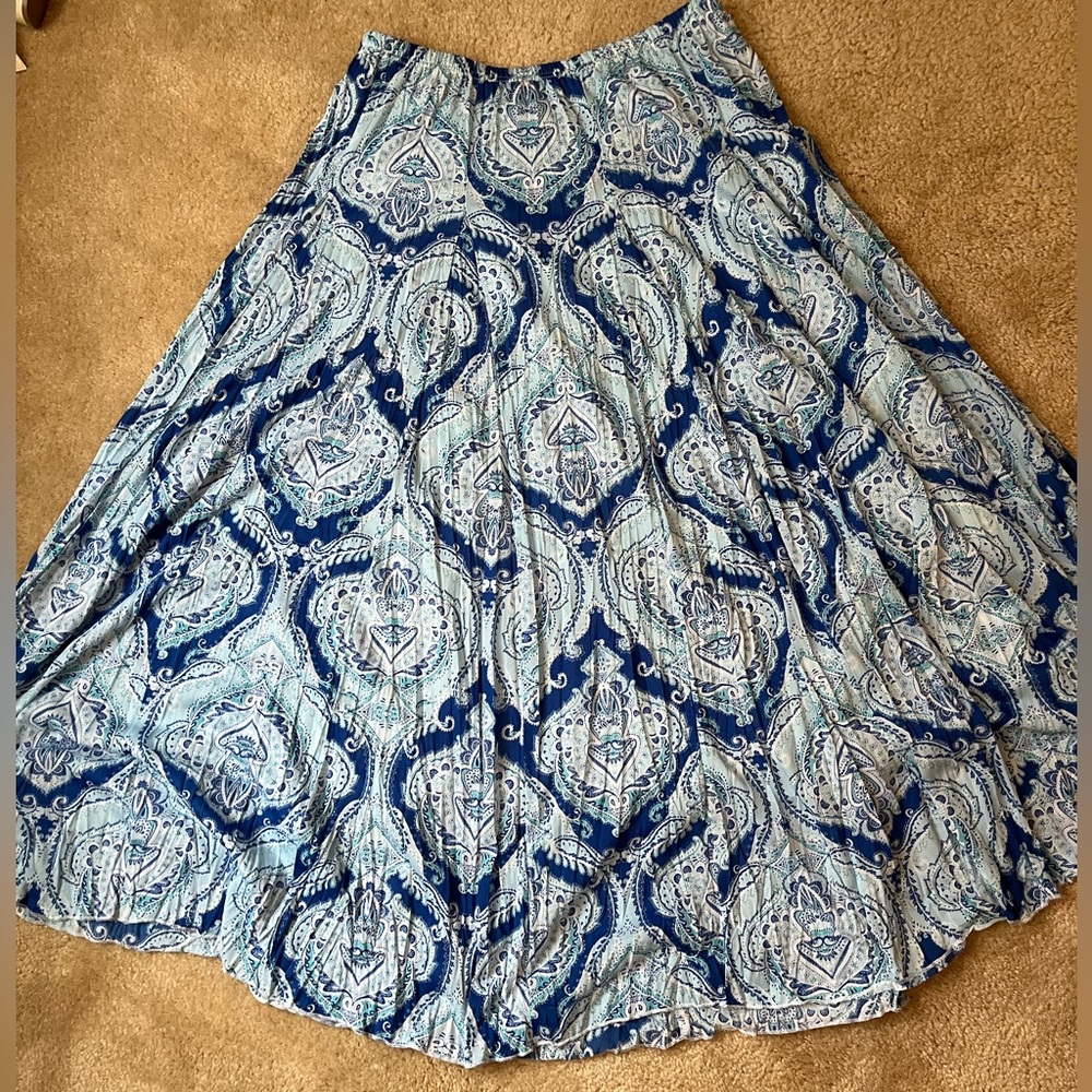 full length flowy blue skirt with designs